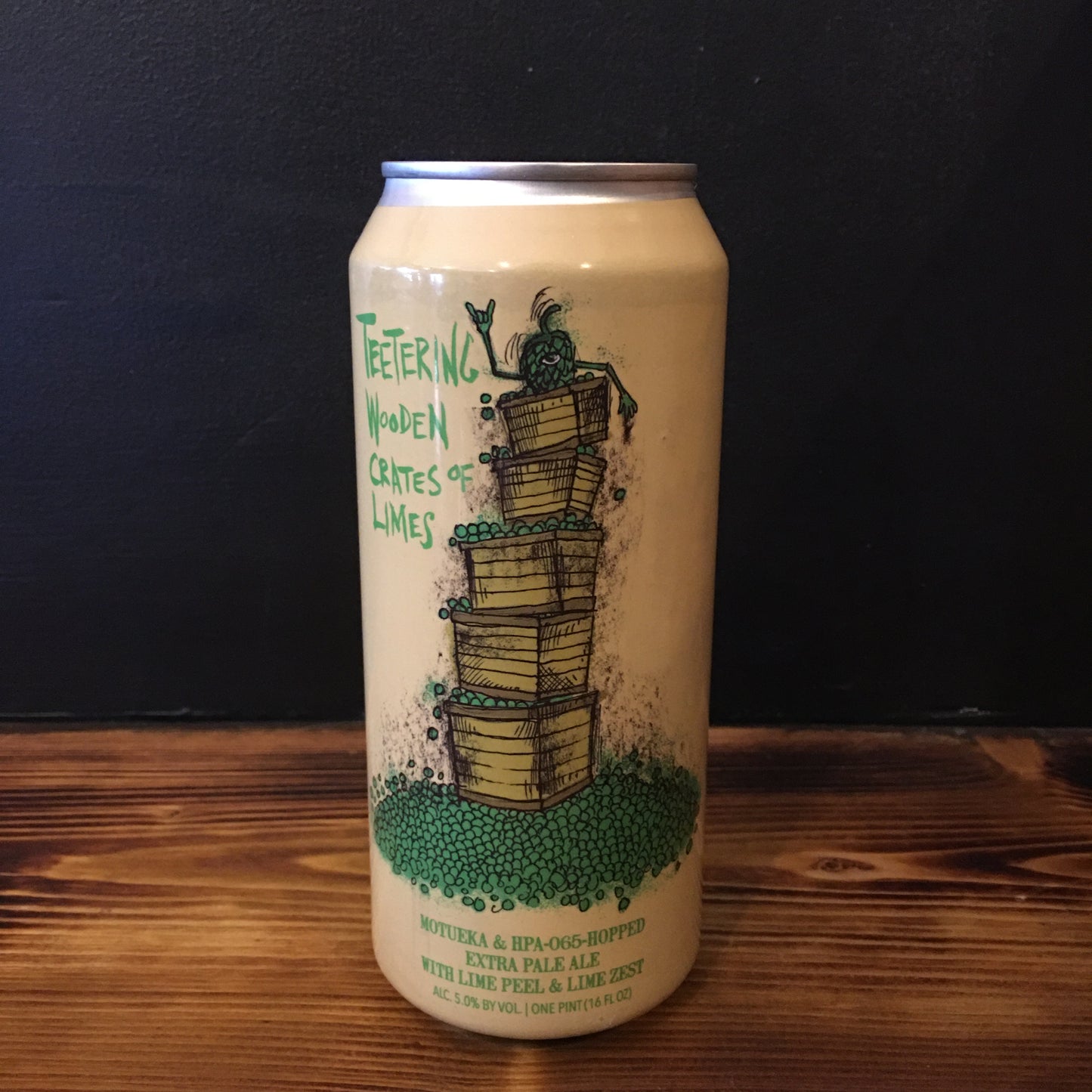 HOP BUTCHER FOR THE WORLD TEETERING WOODEN CRATES OF LIMES PALE 5.0%